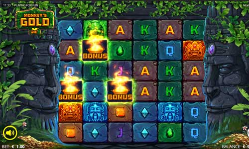 Monkeys Gold base game screenshot showing reels and features